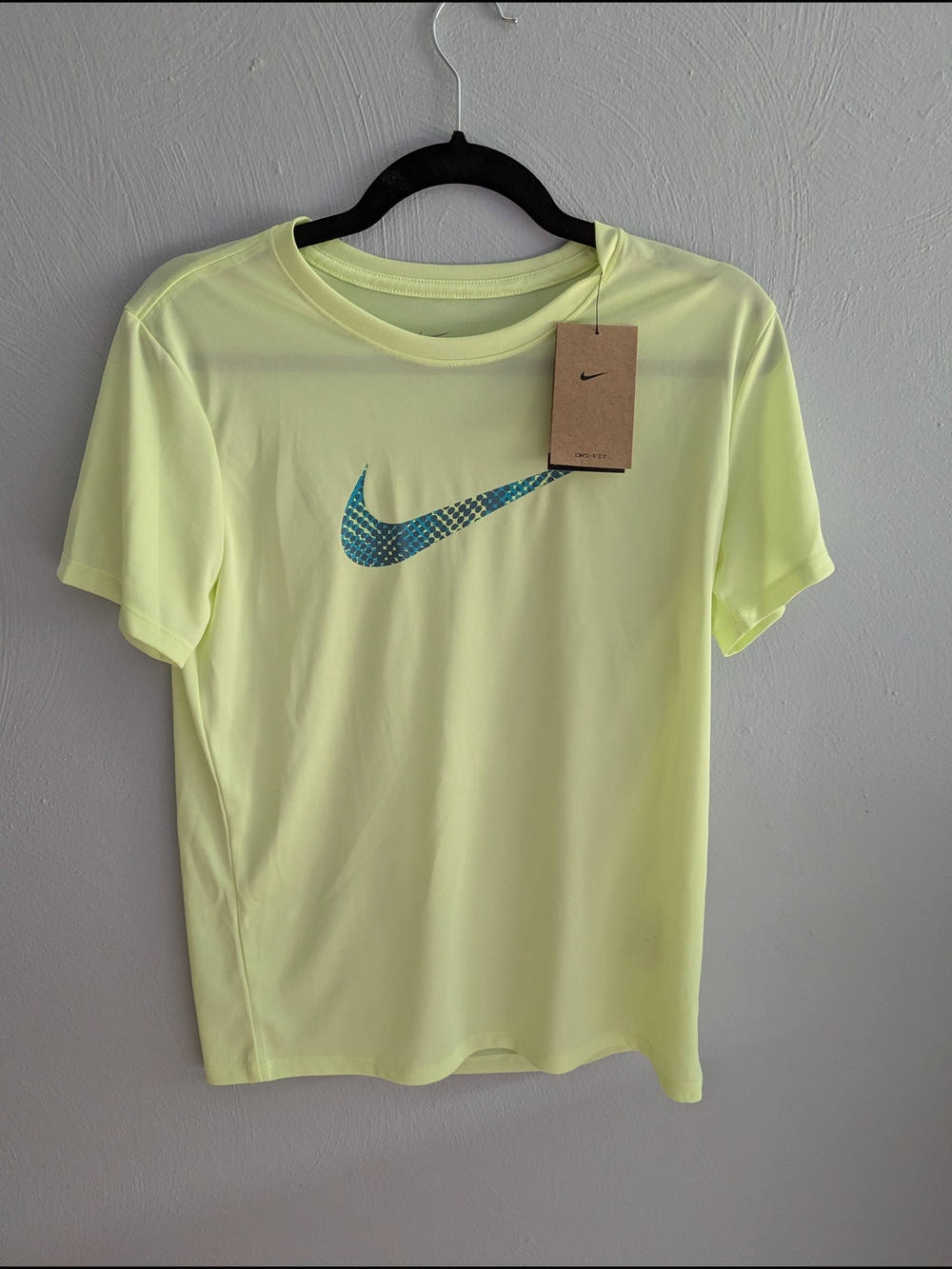 Nike Women's Short-Sleeve Neon Yellow Athletic Tee with Blue Swoosh